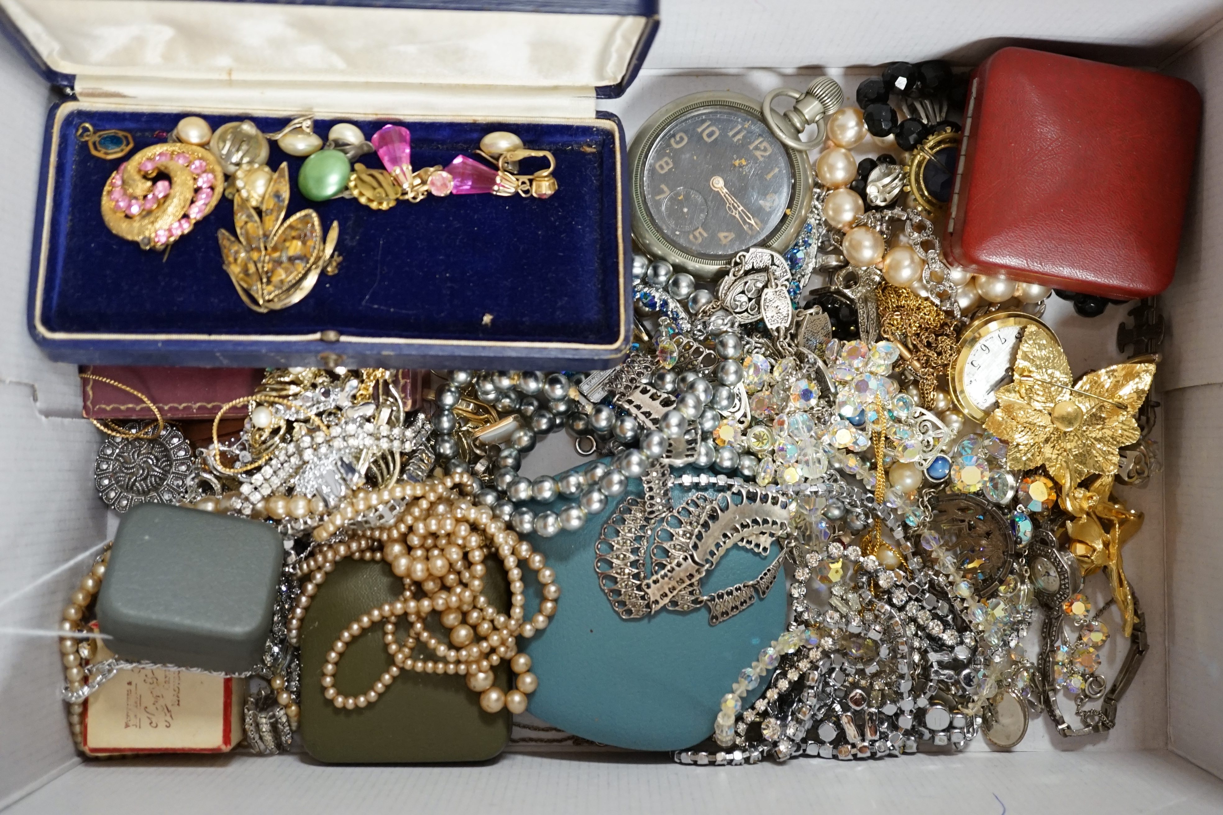 A collection of costume jewellery, some silver to include two 9ct gold cross pendants, marcasite brooches/necklaces and a pair of butterfly wing earrings. Condition - fair